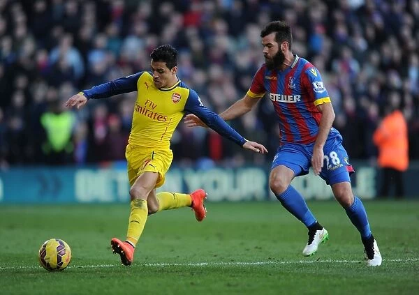 Alexis Sanchez Dashes Past Crystal Palace's Joe Ledley in Arsenal's Premier League Clash