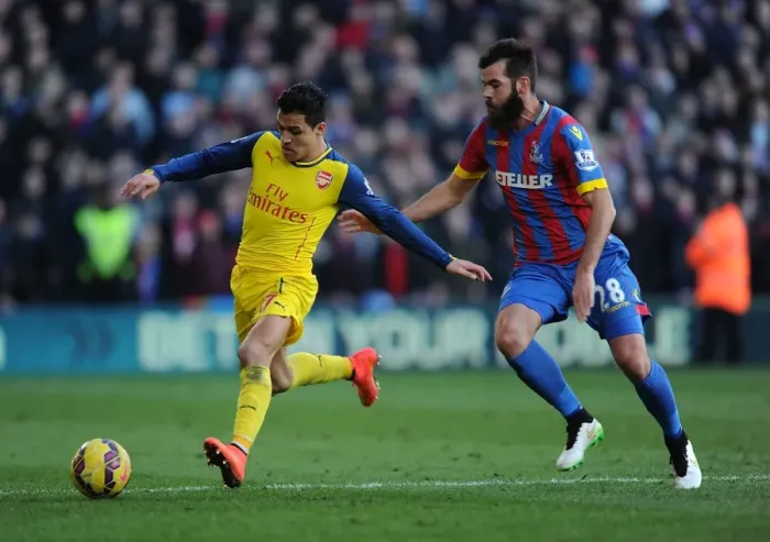 Framed Print : Alexis Sanchez Dashes Past Crystal Palace's Joe Ledley in Arsenal's Premier League Clash