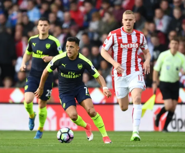 Framed Print : Alexis Sanchez Dashes Past Ryan Shawcross: Thrilling Moment from Stoke City vs. Arsenal, Premier League 2016-17 Framed Print : Alexis Sanchez Dashes Past Ryan Shawcross: Thrilling Moment from Stoke City vs. Arsenal, Premier League 2016-17