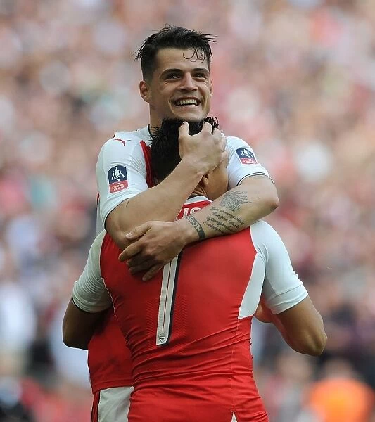 Alexis Sanchez and Granit Xhaka: Celebrating Arsenal's FA Cup Semi-Final Victory Over Manchester City