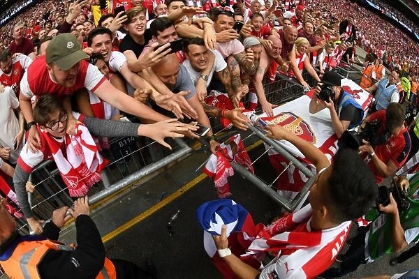Alexis Sanchez and Jubilant Arsenal Fans Celebrate FA Cup Victory over Chelsea
