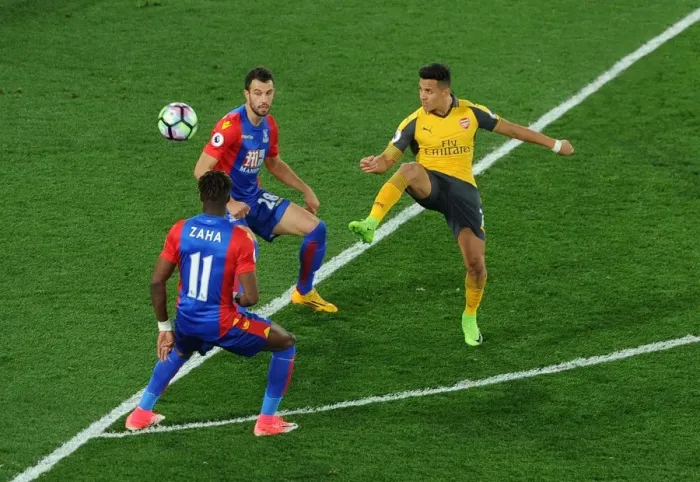Framed Print : Alexis Sanchez Outmaneuvers Wilfred Zaha and Luka Milivojevic in Crystal Palace vs Arsenal Premier League Clash Framed Print : Alexis Sanchez Outmaneuvers Wilfred Zaha and Luka Milivojevic in Crystal Palace vs Arsenal Premier League Clash