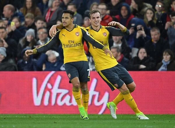 Alexis Sanchez and Rob Holding Celebrate Arsenal's First Goal vs Middlesbrough (2016-17)