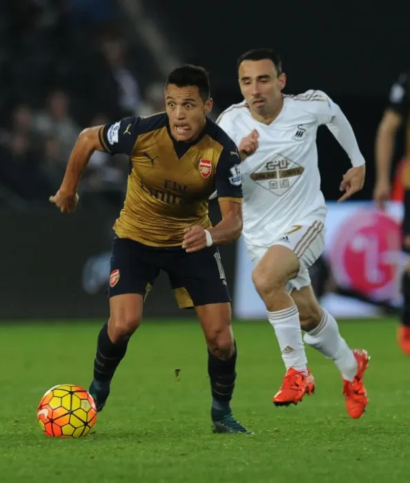 Framed Print : Alexis Sanchez Surges Past Leon Britton: Swansea City vs Arsenal, Premier League 2015-16 - A Moment of Brilliance Framed Print : Alexis Sanchez Surges Past Leon Britton: Swansea City vs Arsenal, Premier League 2015-16 - A Moment of Brilliance