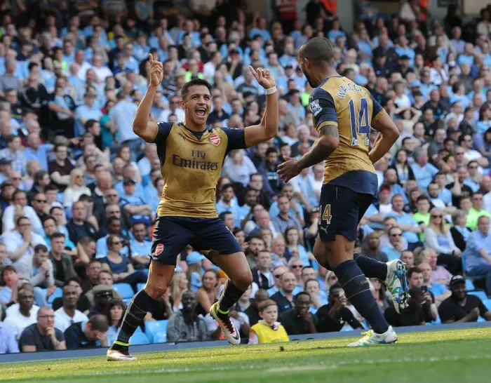 Framed Print : Alexis Sanchez and Theo Walcott: Arsenal's Unstoppable Duo Celebrate Goals Against Manchester City (May 2016)