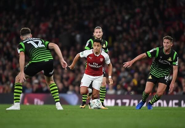 Alexis Sanchez vs. Ben Whiteman and Joe Wright: Arsenal's Star Forward Faces Off Against Doncaster's Defenders in Carabao Cup Clash