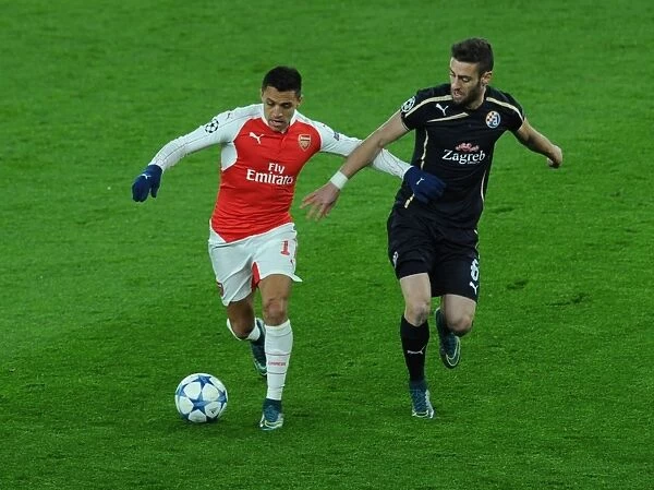 Alexis Sanchez vs. Ivo Pinto: A Football Battle in the Arsenal vs. Dinamo Zagreb Champions League Clash