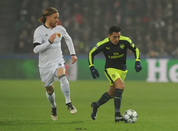 Framed Print : Alexis Sanchez vs Michael Lang: A Football Battle in the 2016-17 UEFA Champions League: FC Basel vs Arsenal