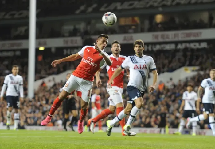 Framed Print : Alexis Sanchez vs. Tottenhotpur: Arsenal Star Faces Off in Intense Capital One Cup Clash