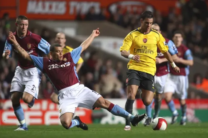 Framed Print : Aliadiere and Bouma Clash: Arsenal's 1-0 Victory Over Aston Villa, March 2007 Framed Print : Aliadiere and Bouma Clash: Arsenal's 1-0 Victory Over Aston Villa, March 2007