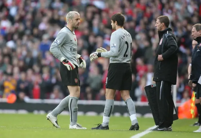 Framed Print : Almunia Injured: Fabianski Steps Up as Arsenal Edge Manchester United 2-1