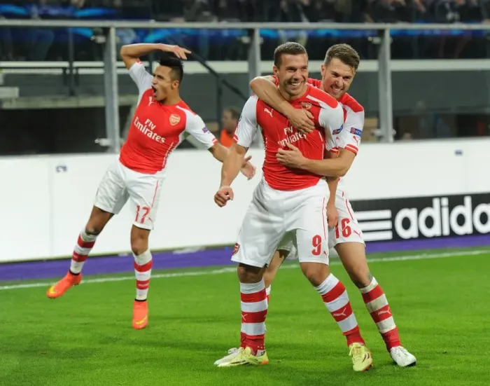 Framed Print : Anderlecht vs Arsenal: Lukas Podolski Scores Brace, Alexis Sanchez and Aaron Ramsey Celebrate