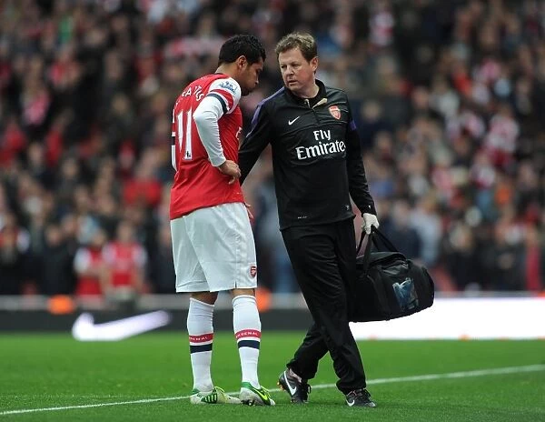 Andre Santos (Arsenal) with Colin Lewin the Arsenal Physio. Arsenal 5:2 Tottenham Hotspur