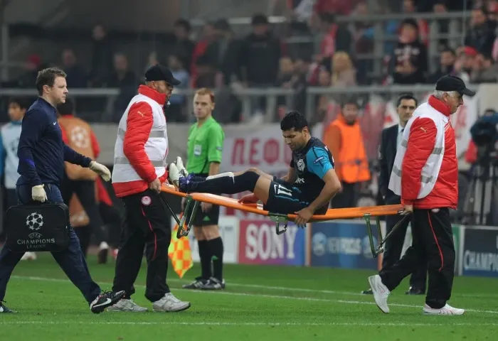 Framed Print : Andre Santos Carried Off Injured: Olympiacos vs Arsenal, UEFA Champions League, 2011 Framed Print : Andre Santos Carried Off Injured: Olympiacos vs Arsenal, UEFA Champions League, 2011