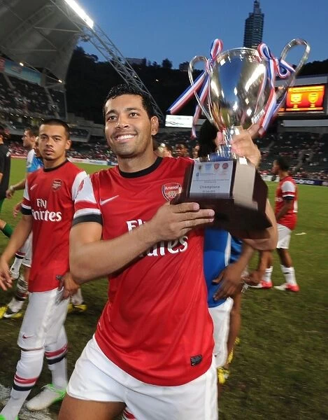 Andre Santos Lifts Arsenal's Pre-Season Trophy after Kitchee FC Victory, 2012