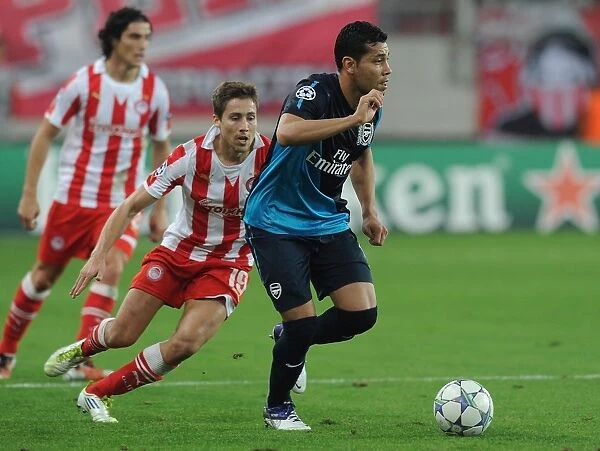 Andre Santos vs. David Fuster: A Battle in the UEFA Champions League between Olympiacos and Arsenal