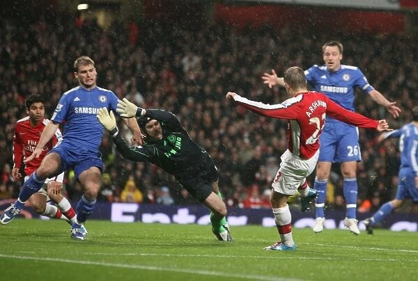 Andrey Arsahvin (Arsenal) shoots past Petr Cech but his goal is disallowed