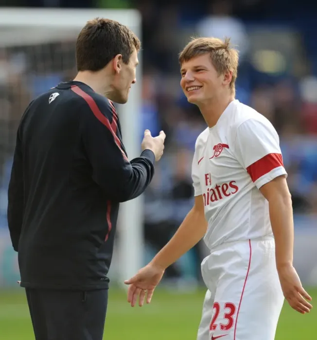 Framed Print : Andrey Arsahvin jokes with Arsenal doctor Gary O Driscoll. Chelsea 2: 0 Arsenal