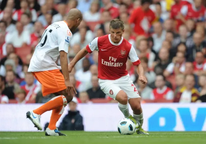 Framed Print : Andrey Arshavin (Arsenal) Alex Baptiste (Blackpool). Arsenal 6: 0 Blackpool Framed Print : Andrey Arshavin (Arsenal) Alex Baptiste (Blackpool). Arsenal 6: 0 Blackpool