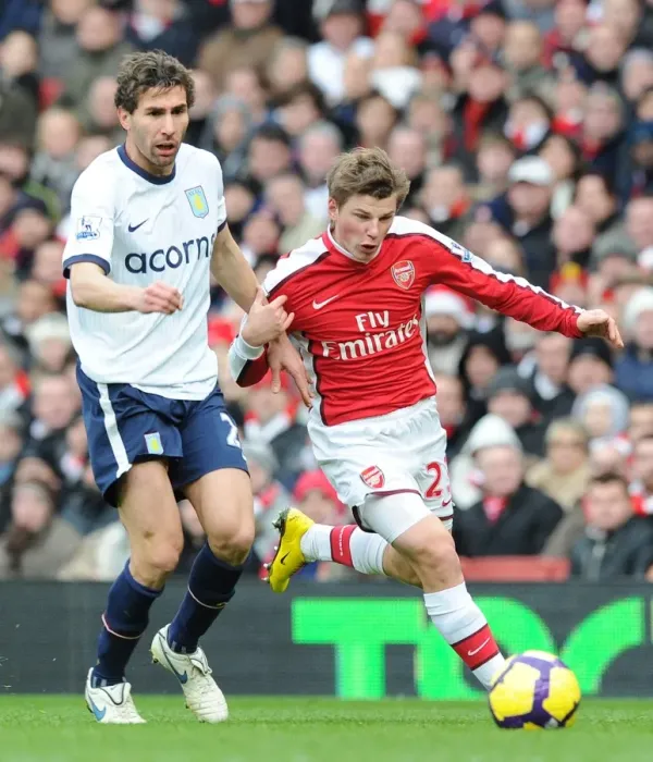 Framed Print : Andrey Arshavin (Arsenal) Carlos Cuellar (Aston Villa). Arsenal 3: 0 Aston Villa Framed Print : Andrey Arshavin (Arsenal) Carlos Cuellar (Aston Villa). Arsenal 3: 0 Aston Villa