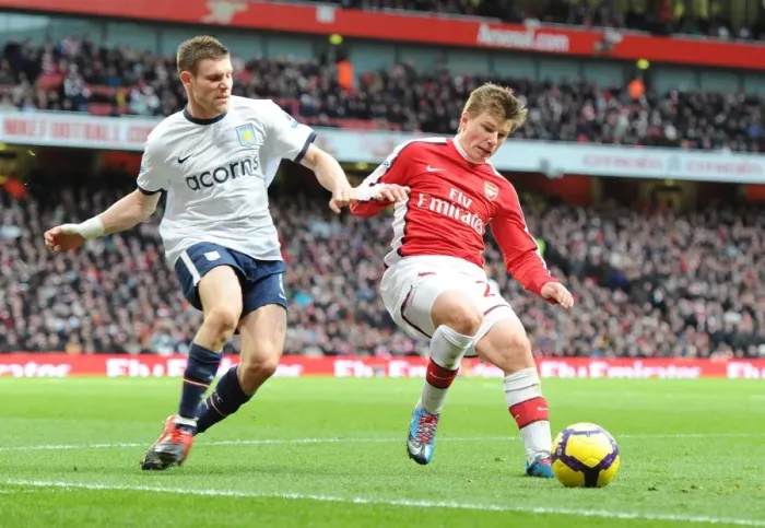 Framed Print : Andrey Arshavin (Arsenal) James Milner (Aston Villa). Arsenal 3: 0 Aston Villa