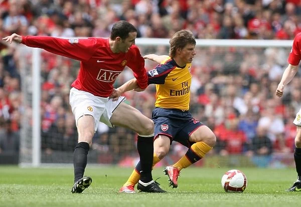 Andrey Arshavin (Arsenal) John O Shea (Man United)
