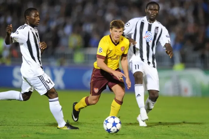 Framed Print : Andrey Arshavin (Arsenal) Medo and Pierre Boya (Partizan). Partizan Belgrade 1: 3 Arsenal