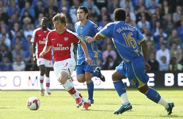 Andrey Arshavin (Arsenal) Noe Pamarot (Portsmouth)