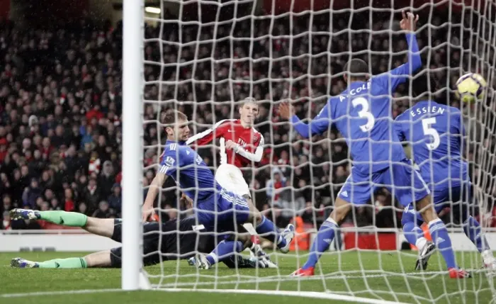 Framed Print : Andrey Arshavin (Arsenal) scores a goal that is disallowed for an earlier foul on the keeper Framed Print : Andrey Arshavin (Arsenal) scores a goal that is disallowed for an earlier foul on the keeper