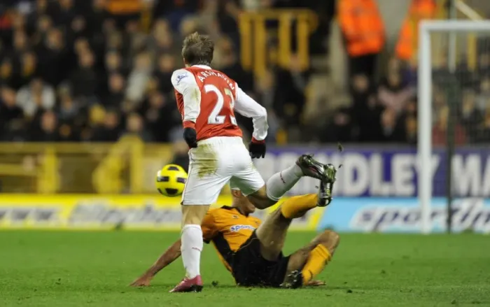 Framed Print : Andrey Arshavin (Arsenal) tackled by Karl Henry (Wolves). Wolverhampton Wanderers 0