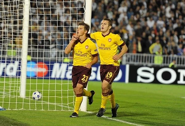 Andrey Arshavin celebrates scoring the 1st Arsenal goal with Jack Wilshere