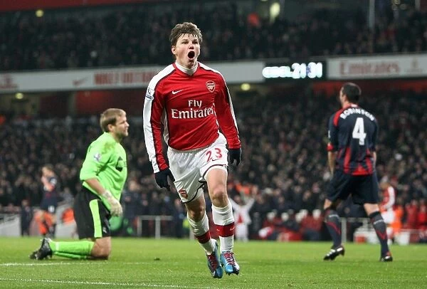 Andrey Arshavin celebrates scoring Arsenals 4th goal. Arsenal 4: 2 Bolton Wanderers