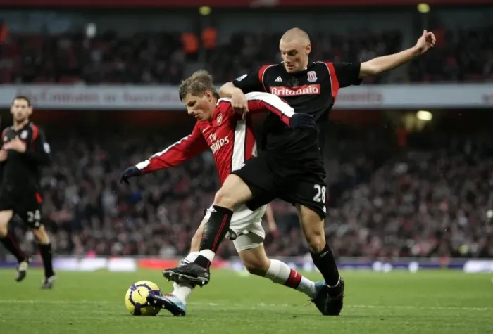Framed Print : Andrey Arshavin holds off Andy Wilkinson (Stoke) on his way to scoring Arsenals 1st goal Framed Print : Andrey Arshavin holds off Andy Wilkinson (Stoke) on his way to scoring Arsenals 1st goal