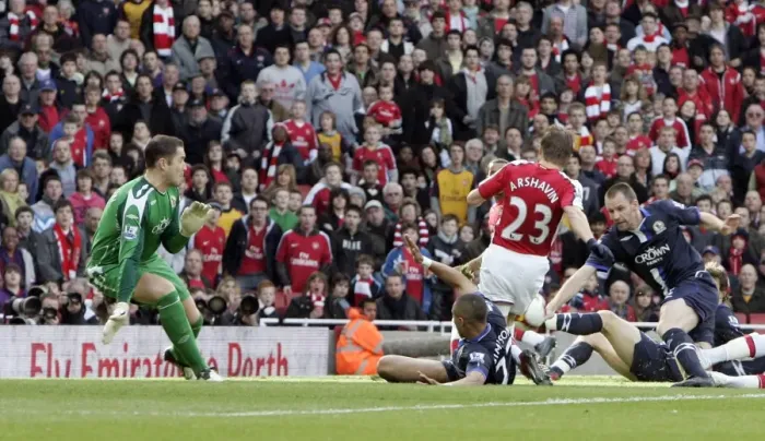Framed Print : Andrey Arshavin scores his and Arsenals 1st goal past Paul Robinson