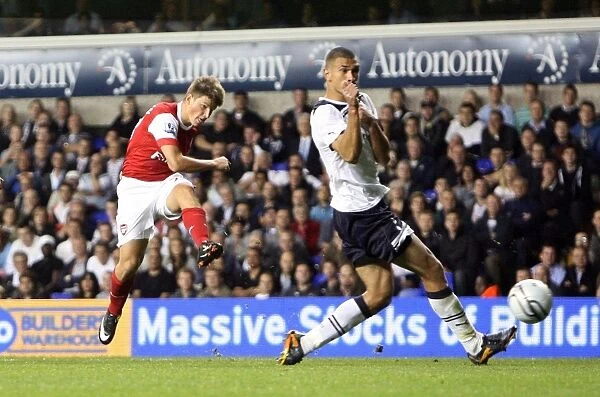 Andrey Arshavin scores Arsenals 4th goal past Steven Caulker (Tottenham)