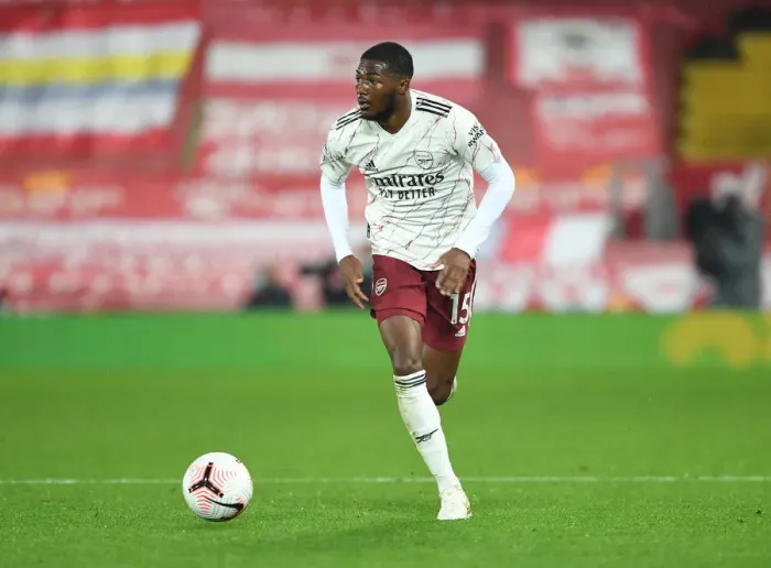 Framed Print : Empty Anfield: Ainsley Maitland-Niles in Action as Liverpool Host Arsenal, 2020-21 Premier League