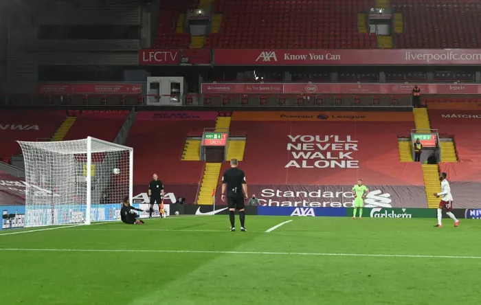 Framed Print : Empty Anfield: Ainsley Maitland-Niles Scores Decisive Penalty in Carabao Cup Showdown Amidst COVID-19 Restrictions Framed Print : Empty Anfield: Ainsley Maitland-Niles Scores Decisive Penalty in Carabao Cup Showdown Amidst COVID-19 Restrictions