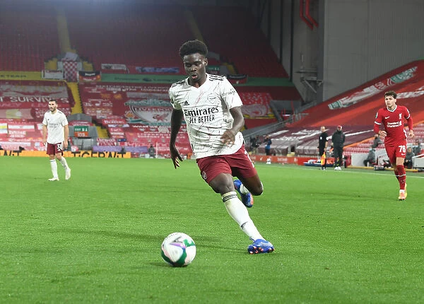 Empty Anfield: Bukayo Saka Leads Arsenal Against Liverpool in Carabao Cup Clash Amidst Pandemic