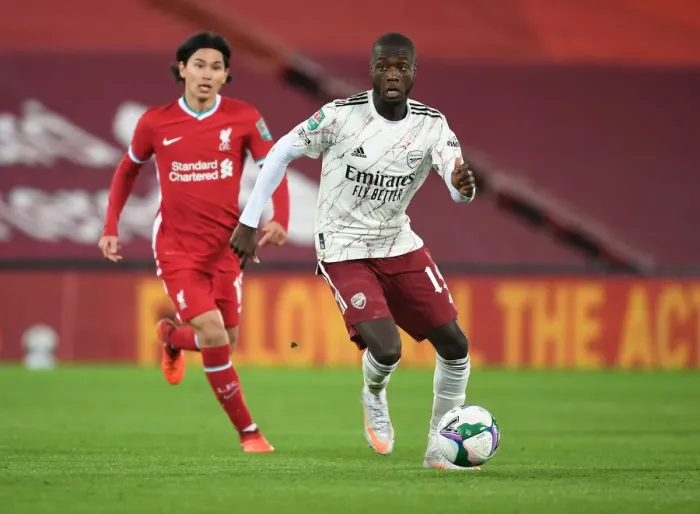 Framed Print : Empty Anfield Showdown: Nicolas Pepe Faces Liverpool in Carabao Cup Amidst Pandemic Framed Print : Empty Anfield Showdown: Nicolas Pepe Faces Liverpool in Carabao Cup Amidst Pandemic