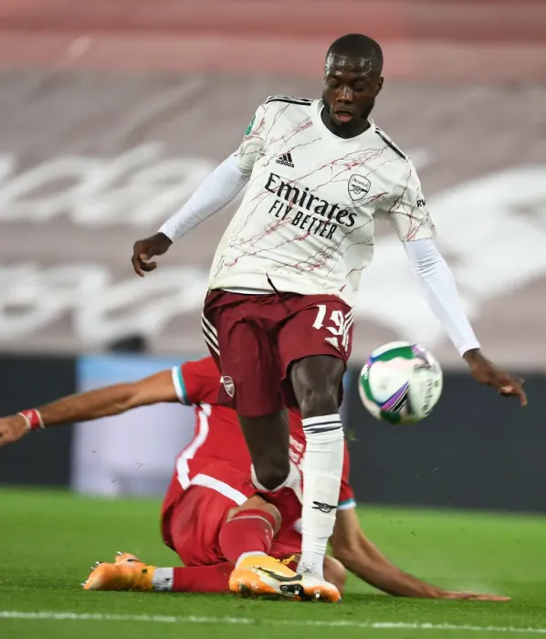 Framed Print : Empty Anfield Showdown: Pepe Leads Arsenal Against Liverpool in Carabao Cup Amidst Coronavirus Pandemic Framed Print : Empty Anfield Showdown: Pepe Leads Arsenal Against Liverpool in Carabao Cup Amidst Coronavirus Pandemic