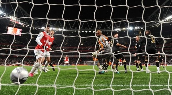 Antolin Alcaraz (Wigan No. 3) scores an own goal for Arsenals 1st goal