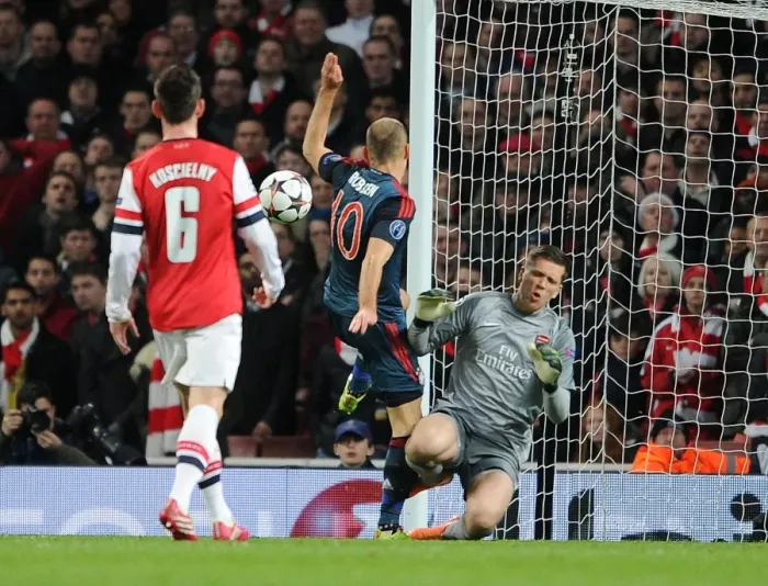 Framed Print : Arjen Robben vs. Wojciech Szczesny: A Penalty Showdown in the Arsenal vs. Bayern Munich UCL Clash (2013-14)