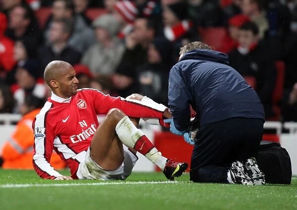 Armand Traore (Arsenal) is treated for an injury. Arsenal 2:0 Stoke City