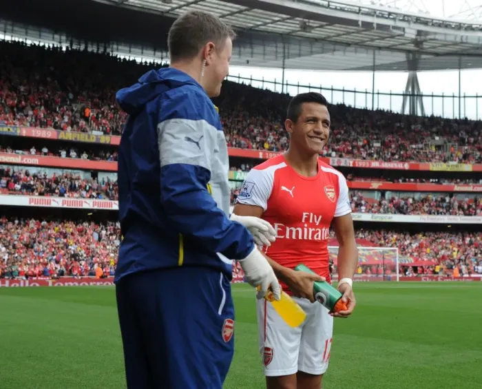Framed Print : Arsenal: Alexis Sanchez and Colin Lewin - Pre-Match Preparation vs Manchester City (2014-15)