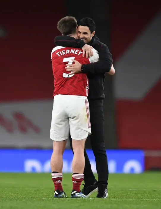 Framed Print : Arsenal: Arteta Comforts Tierney After Intense Arsenal vs. Tottenham Clash Framed Print : Arsenal: Arteta Comforts Tierney After Intense Arsenal vs. Tottenham Clash