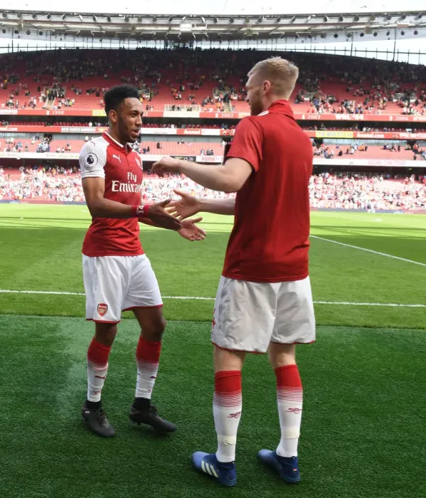 Framed Print : Arsenal: Aubameyang and Mertesacker Celebrate Victory Over West Ham United