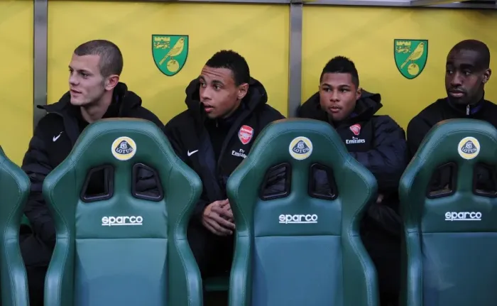 Framed Print : Arsenal Bench: Jack Wilshere, Francis Coquelin, Serge Gnabry, Johan Djourou (Norwich City vs Arsenal, 2012-13)