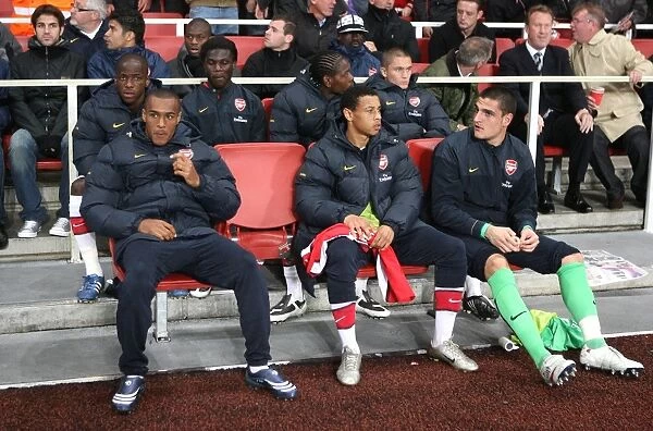 The Arsenal bench : Jay Simpson