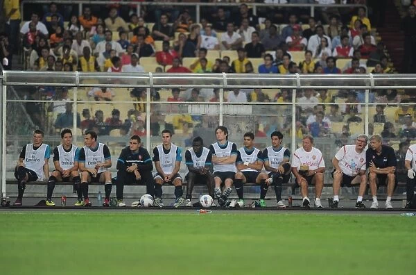 The Arsenal bench. Malaysia XI 0: 4 Arsenal, Bukit Jalil Stadium, Kuala Lumpur, Malaysia, 13  /  7  /  2011