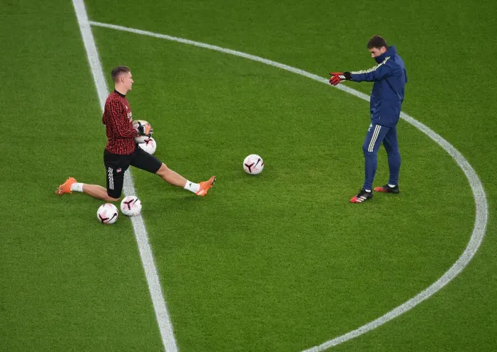 Framed Print : Arsenal: Bernd Leno and Inaki Cana - Pre-Match Chat at Emirates Stadium (Arsenal v Aston Villa, 2020-21)